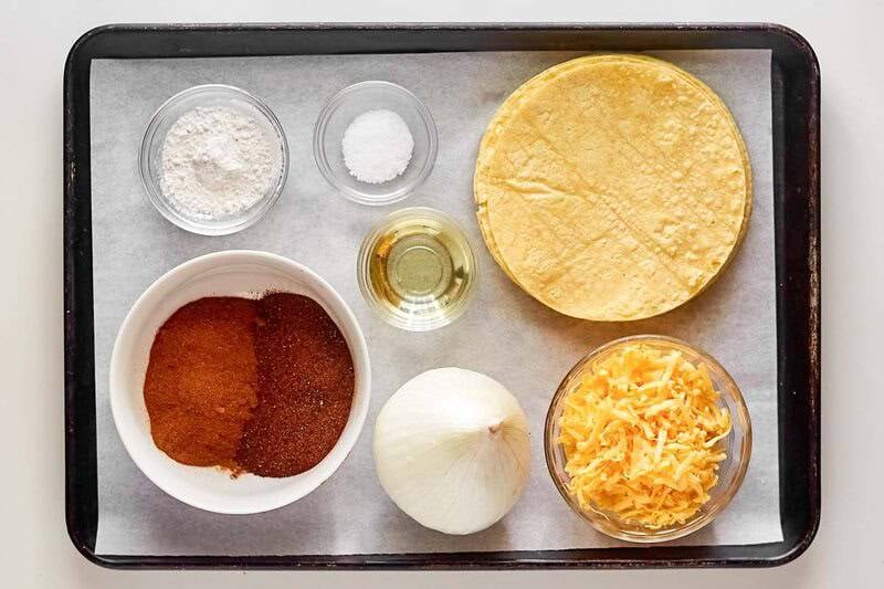Copycat El Chico cheese enchiladas ingredients on a tray.