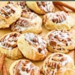 Homemade IKEA cinnamon rolls on parchment paper.
