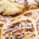 Homemade IKEA cinnamon roll on parchment paper.