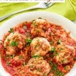 A bowl of homemade Olive Garden meatballs parmigiana garnished with parsley.