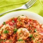 A bowl of copycat Olive Garden meatballs parmigiana.