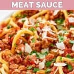 Homemade Olive Garden spicy three meat sauce with bucatini garnished with parsley.