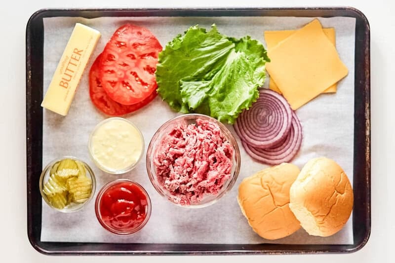 Copycat Smashburger classic smash burger ingredients on a tray.