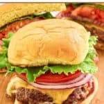 Two homemade Smashburger classic smash burgers and one cut in half.