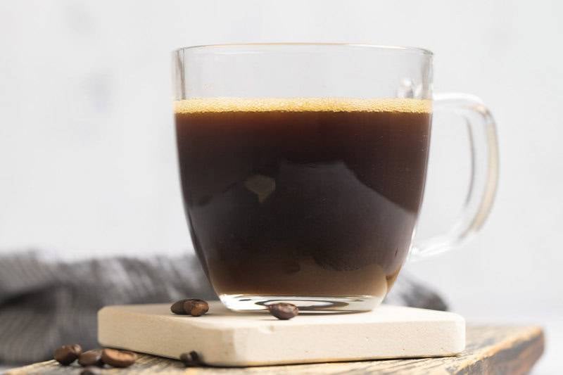 Copycat Starbucks americano on a coaster.