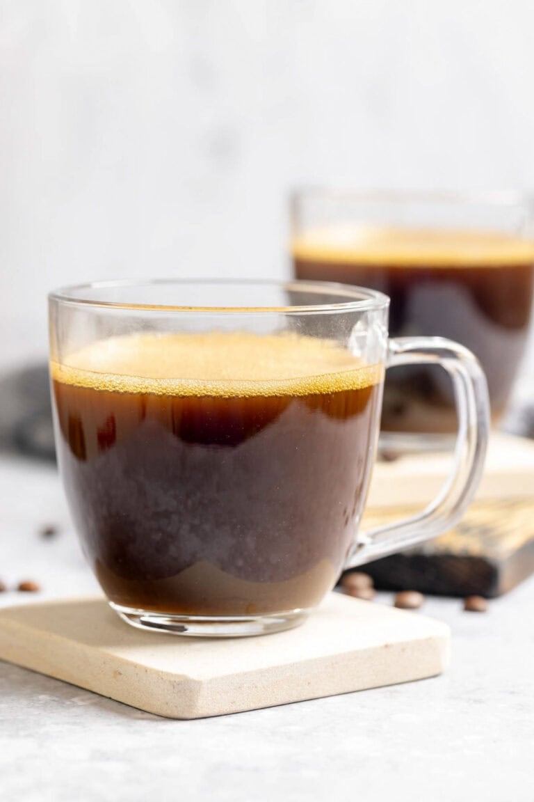 Copycat Starbucks Americano drinks on coasters.
