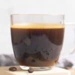 Homemade Starbucks americano coffee drink in a glass mug.