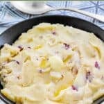 Homemade Cheesecake Factory mashed potatoes in a serving bowl.