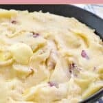 A bowl of buttery homemade Cheesecake Factory mashed potatoes.