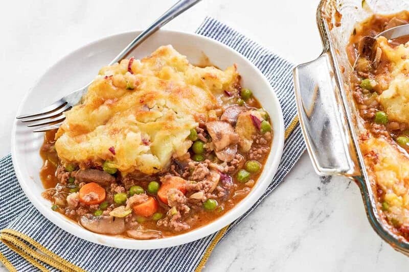 Copycat Cheesecake Factory shepherd's pie and a fork on a plate.