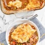 Homemade Cheesecake Factory shepherd's pie and a serving on a plate.