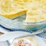 Homemade eggnog pie and a slice on a plate.