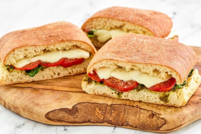 Three copycat Starbucks tomato and mozzarella on focaccia sandwiches.