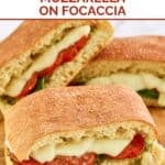 Homemade Starbucks sandwich with tomato, mozzarella, spinach, and pesto on focaccia.