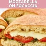 Homemade Starbucks tomato and mozzarella on focaccia sandwich with pesto and spinach.