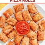 Homemade Totino's pepperoni pizza rolls and a cup of marinara on a platter.