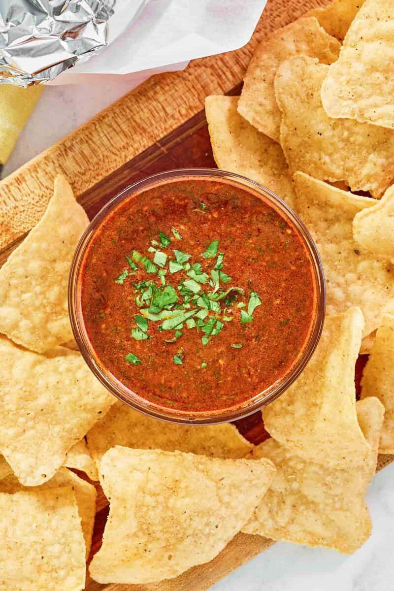 Copycat Chipotle Mexican Grill red chimichurri sauce and tortilla chips.