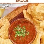 Homemade Chipotle red chimichurri sauce and tortilla chips on a platter.