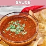 A small bowl of copycat Chipotle red chimichurri sauce garnished with cilantro.