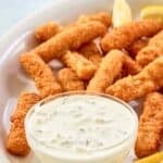 Homemade Skippers tartar sauce served with fried fish sticks.