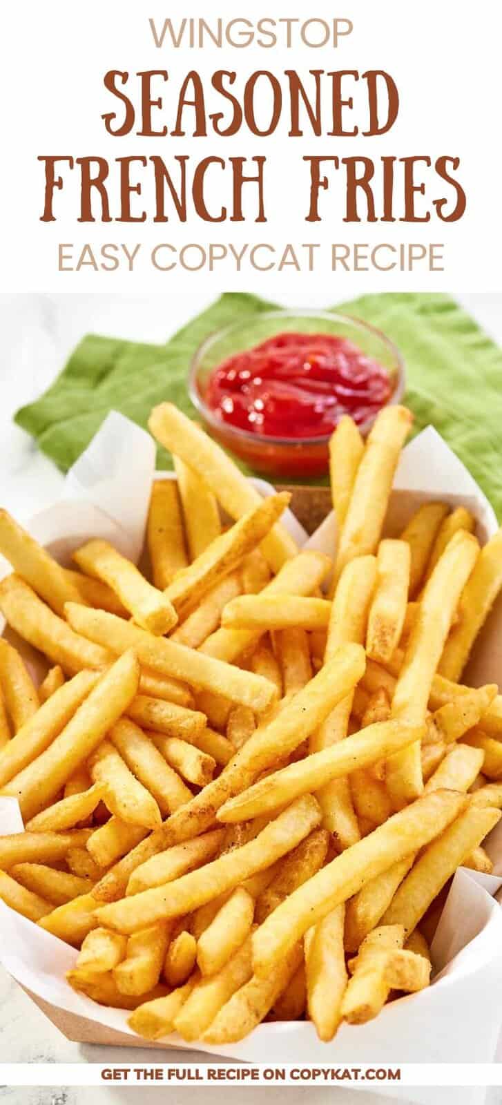 Homemade Wingstop seasoned French fries in a parchment paper lined basket.