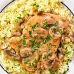 Homemade Cracker Barrel chicken and rice served with mushroom gravy.
