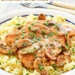 Homemade Cracker Barrel chicken and rice on a plate garnished with parsley.