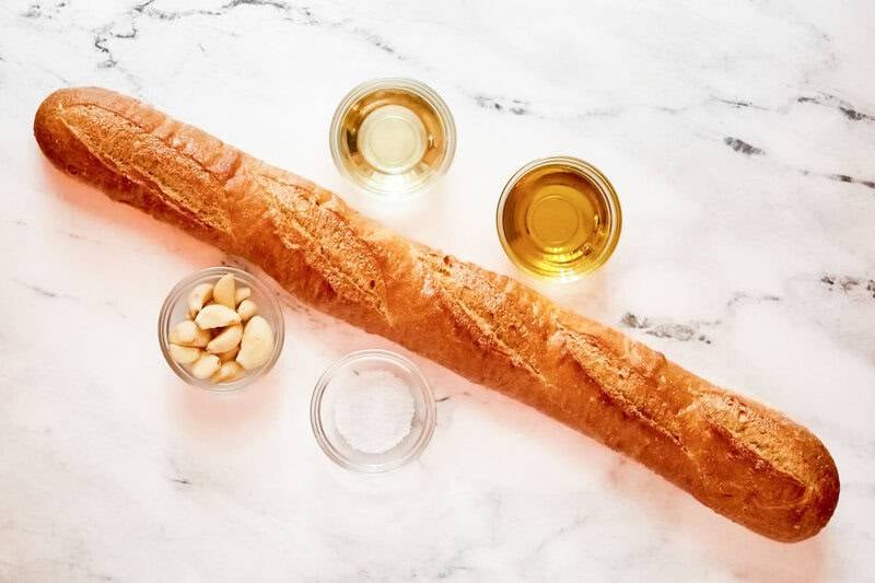 Copycat Jason's Deli garlic toast ingredients on a marble surface.