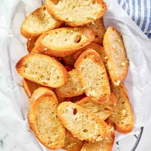 Copycat Jason's Deli garlic toast in a parchment-lined serving basket.