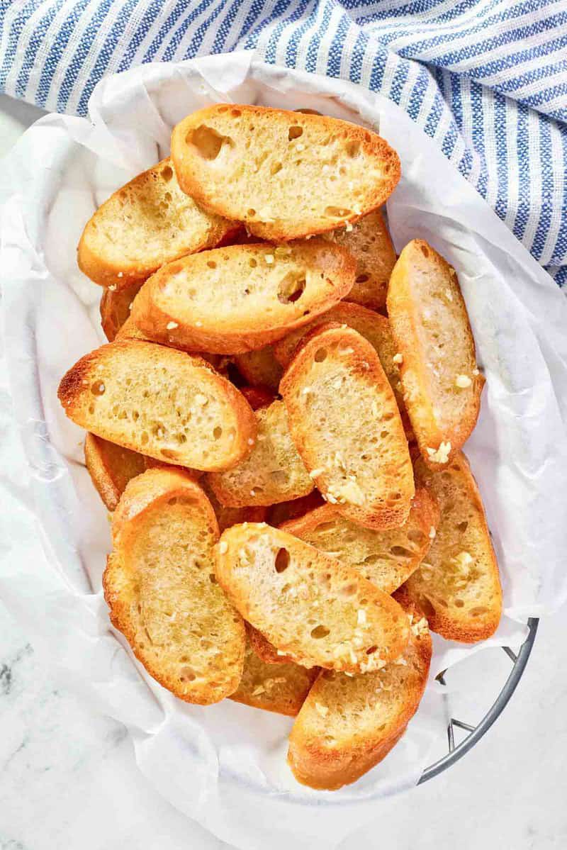 Copycat Jason's Deli garlic toast in a parchment-lined serving basket.