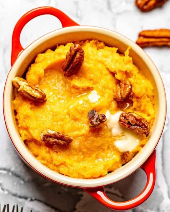 Copycat Red Lobster whipped sweet potatoes with honey roasted pecans on top.