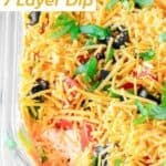 Ultimate 7 layer dip in a glass casserole dish.