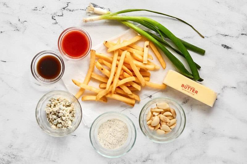 Buffalo fries ingredients on a marble surface.