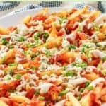 Homemade buffalo fries on a platter on a marble surface.