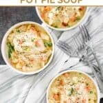 Bowls of pot pie soup made with chicken, veggies, and puff pastry.