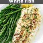 Tender, flaky fish fillet, green beans, and lemon wedges.