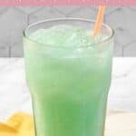 Homemade Taco Bell Dirty Mountain Dew Baja blast dream soda in a glass with a straw.
