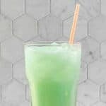 A glass of copycat Taco Bell dirty Mountain Dew Baja blast dream soda.