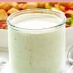 Homemade Texas Roadhouse ranch dressing in a small glass jar.