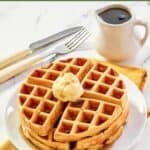 Copycat Waffle House waffles in a stack and topped with butter and syrup.