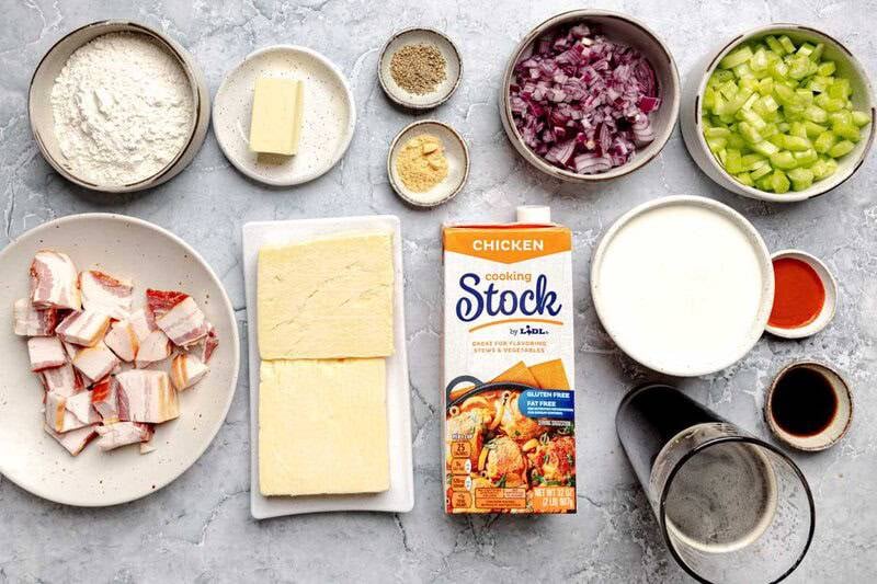 White cheddar cheese, bacon, dark beer, veggies, butter, flour, stock, milk, and seasonings.