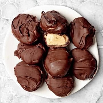 Homemade chocolate peanut butter egg candy pieces served on a plate.