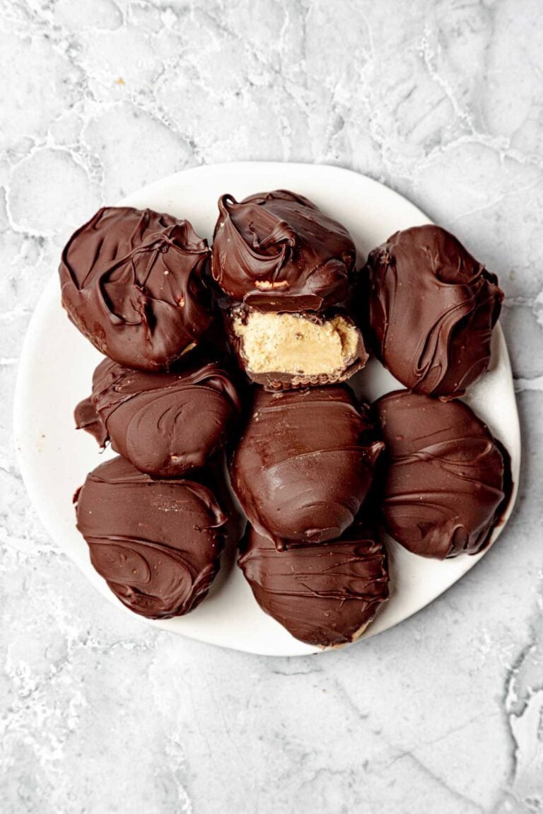 Homemade chocolate peanut butter egg candy pieces served on a plate.