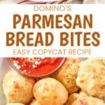 A platter of bread bites served with marinara sauce.