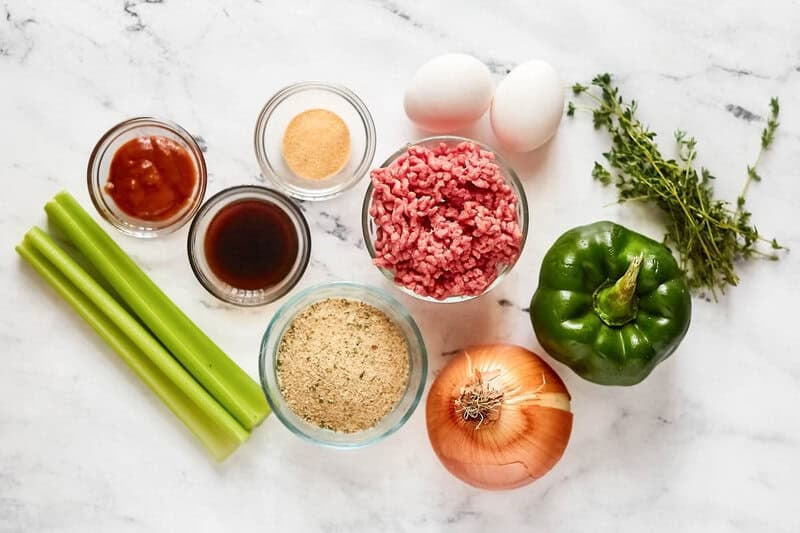 Ground beef, Heinz 57 sauce, breadcrumbs, eggs, vegetables, worcestershire sauce and thyme.