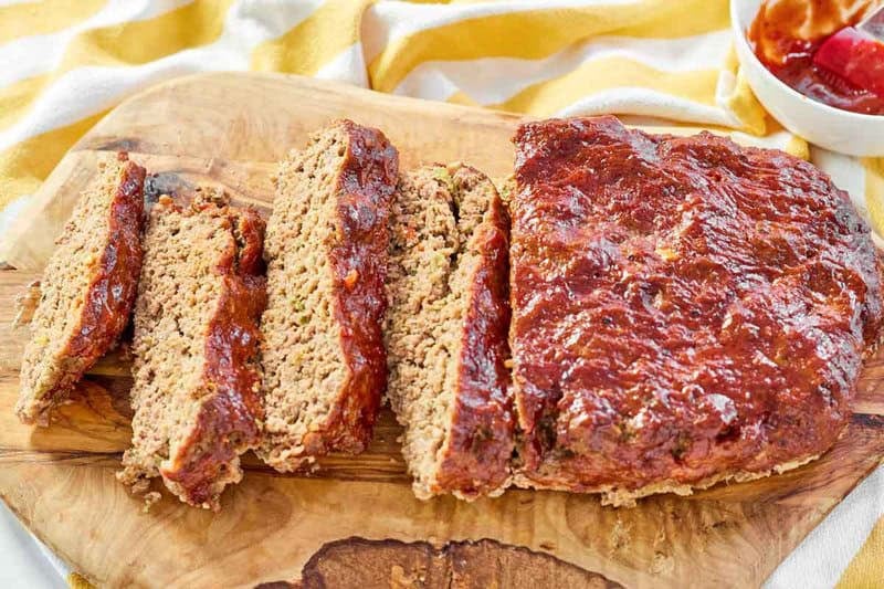 Old-fashioned glazed meatloaf sliced and ready to serve.
