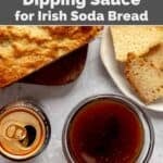 Guinness dipping sauce next to freshly baked Irish soda bread and a can of beer.