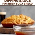 A bowl of Guinness stout dipping sauce in front of a loaf of Irish soda bread.