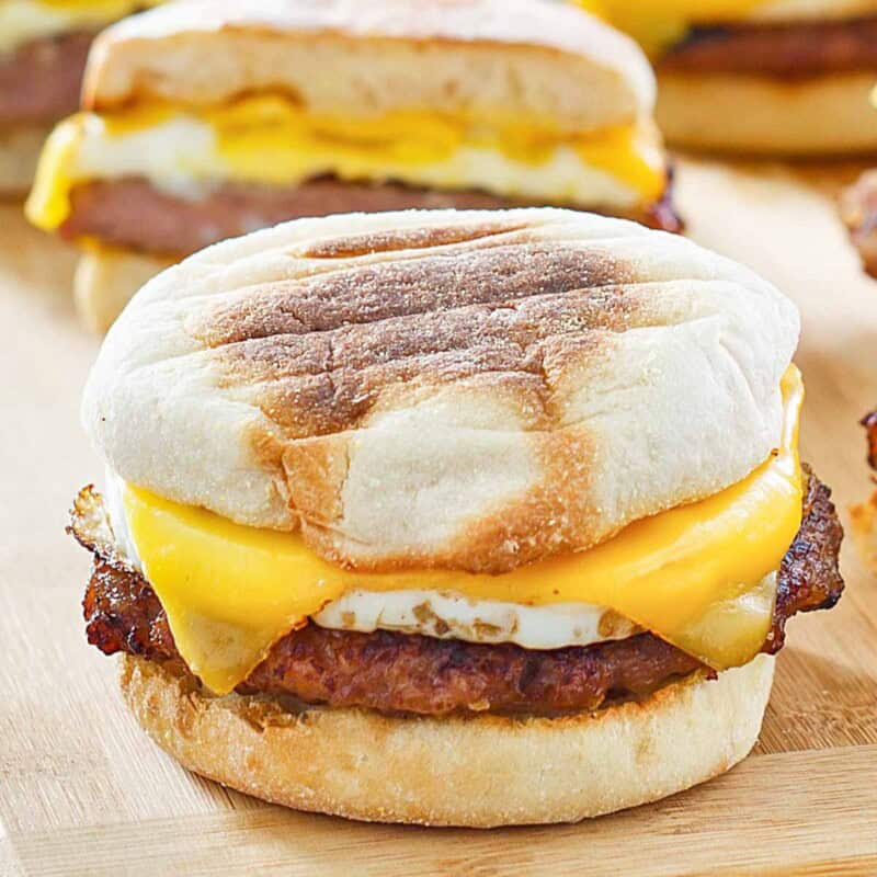 Breakfast sandwich with egg, cheese, and sausage.