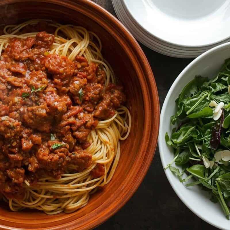 Spaghetti with meat sauce and a simple mixed green salad.